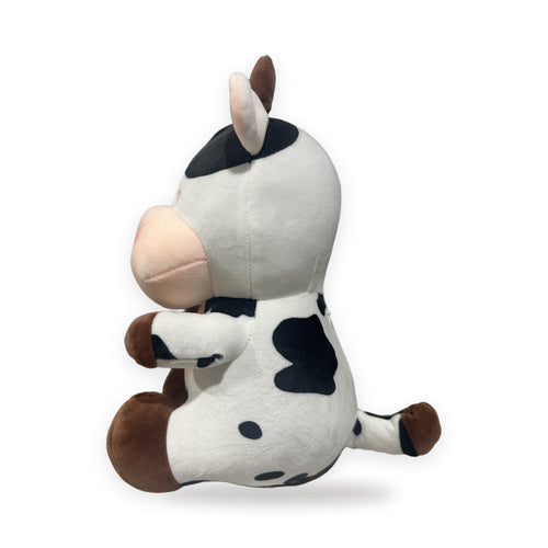 Peluche vaca que respira, vista de lado
