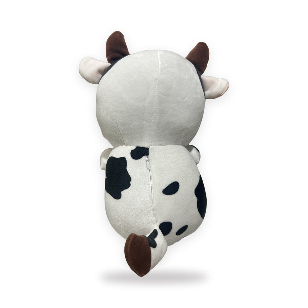 Peluche vaca que respira, vista de espalda